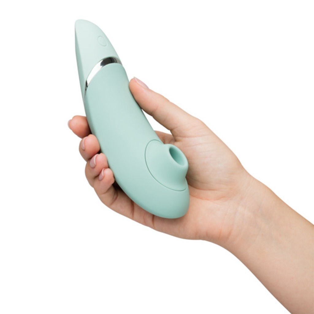 Womanizer Next 3D Pleasure Air Sage in hand