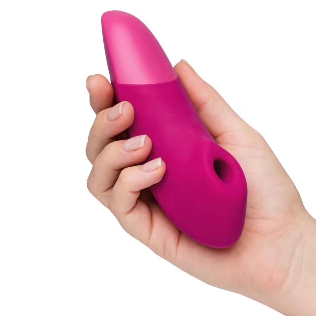 womanizer enhance pink in hand
